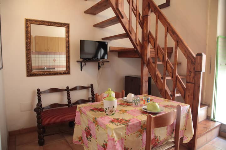 downstairs: table and digital/sat tv 