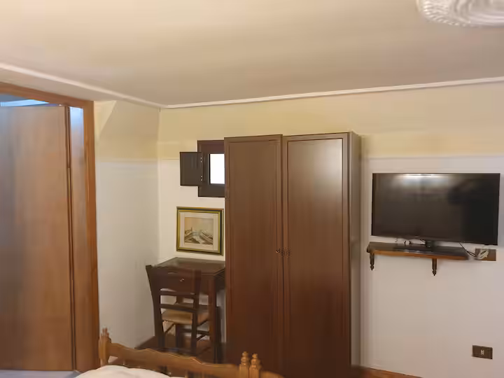 Sleeping loft and indipendent bathroom on the left